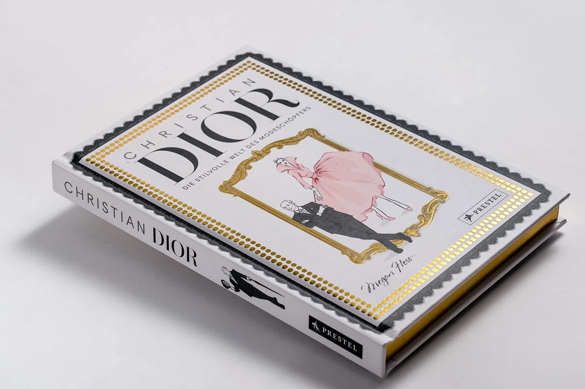 Christian Dior: Die stilvolle Welt des Modeschöpfers. Mit Goldschnitt und Goldfolienprägung (Megan Hess: Bewegte Leben aus der Modewelt, Band 2)